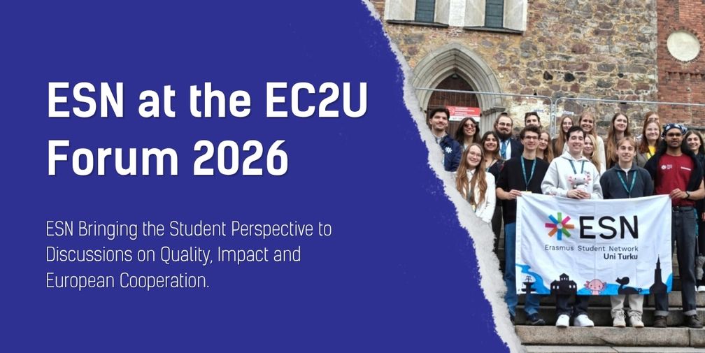 students holding ESN flag standing on stairs